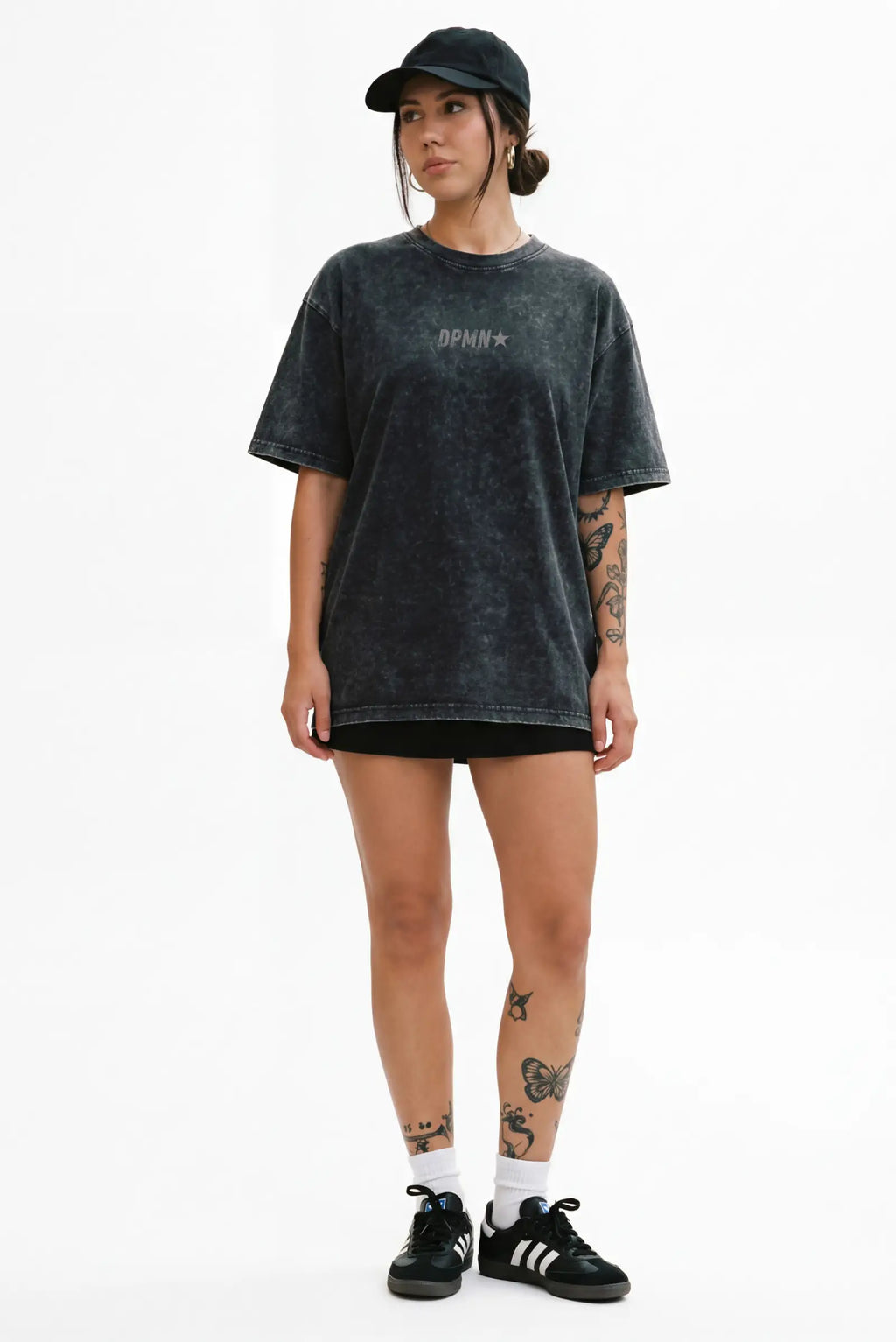 Playera DPMN oversized tee negra acid washed logo DPMN estrella frontal streetwear unisex