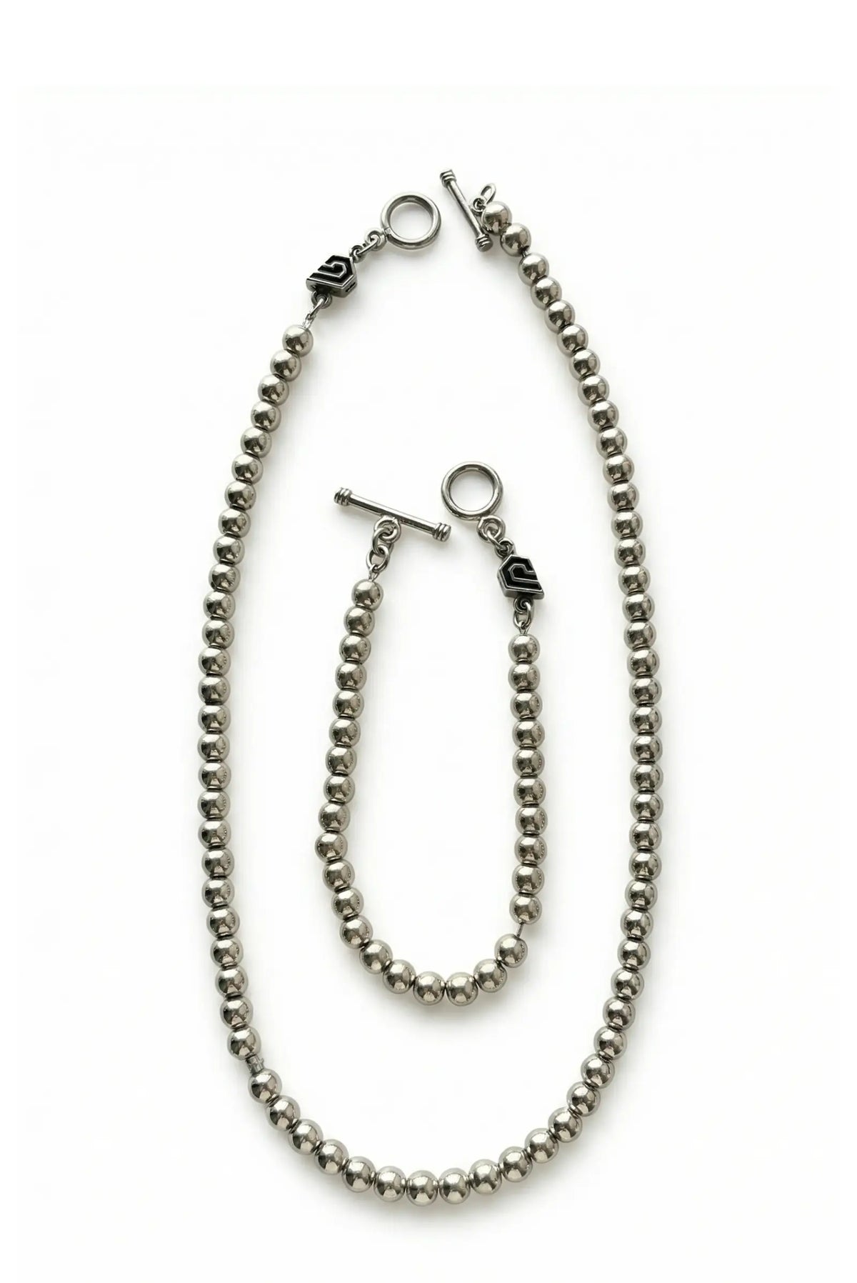 Set Sphere, pulsera y gargantilla  con perlas de plata y logo dopamyn.