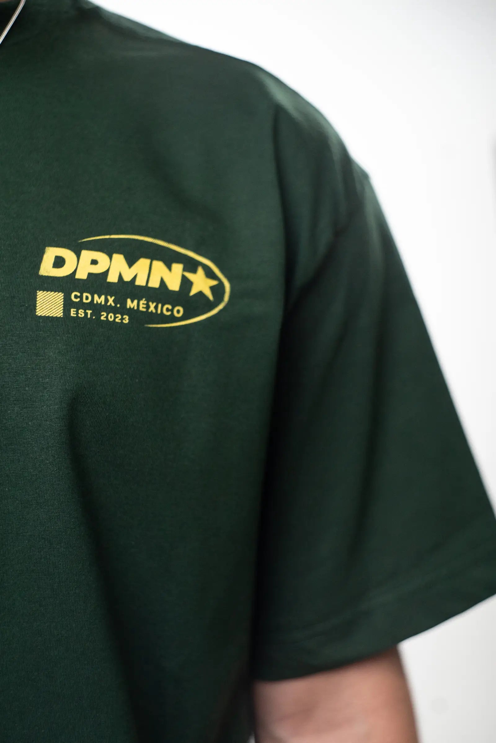 Signature DPMN Oversized Tee — Dark Green